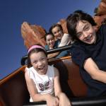 The Four Children having a blast on a rollercoaster